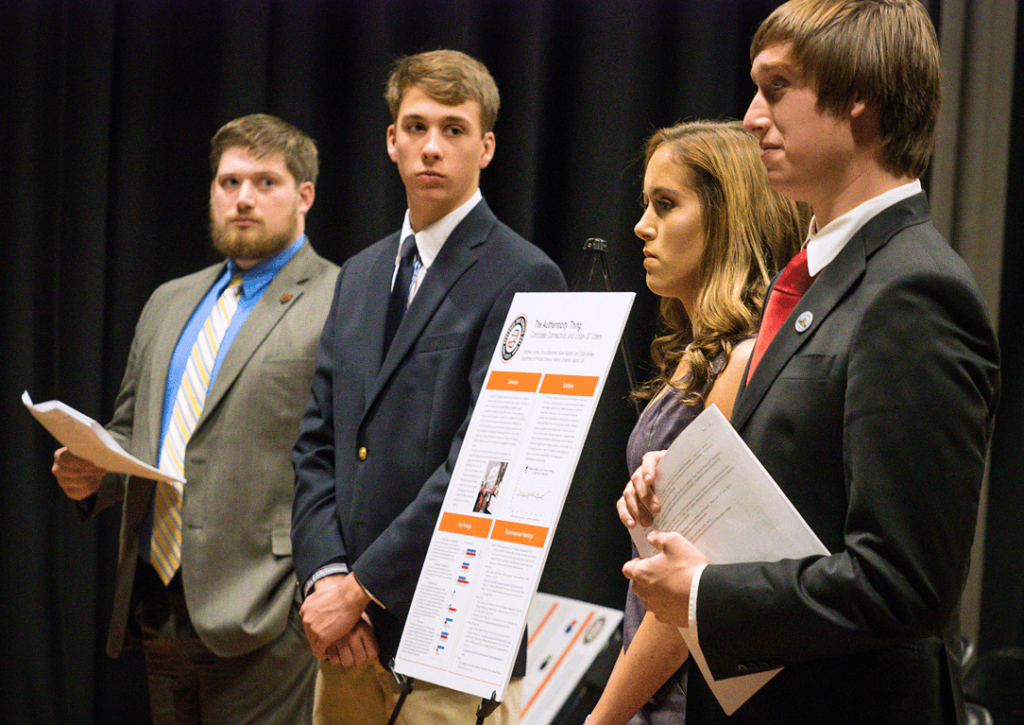 Mercer students in the Campaigns and Elections course present their group projects to political consultants and their peers during the Nov. 27 event at Tattnall Square Center for the Arts