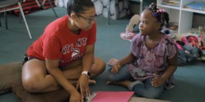 Mercer University senior Ashanti Griggs works with a student one-on-one at Freedom School.